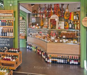 MUNICH, GERMANY - MAY 24,2014. Groceries and delicacies on display at one of many gourmet shops at Viktualien Markt in Munich center, food landmark for habitués and tourists